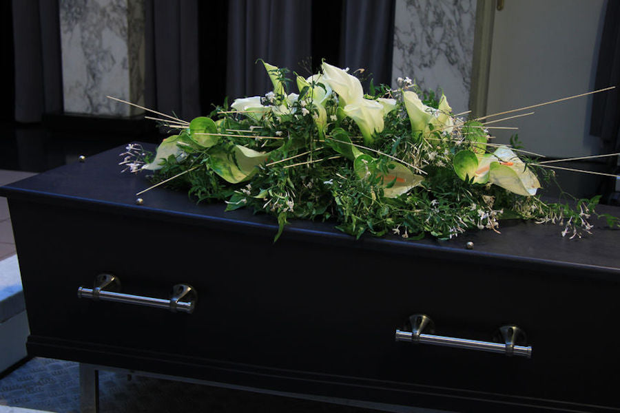 Who is allowed to officiate a funeral service in the UK?
