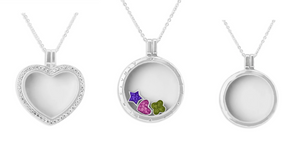 Glass lockets with elements containing ashes set in resin